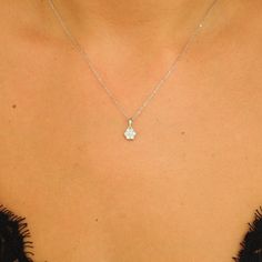 Explore our Illusion Diamond Necklace, a captivating piece that emanates the hidden fragrance of nature, making it a must-have accessory in your collection.   Diamond Specifications: * Type: Natural, Genuine Diamonds (Ethically Mined) * Color: D-F (whitest level of white Diamonds) * Clarity: VS/VVS (Microscopically clean) * Total Weight: 0.30 Ct * Number of Stones: 7 Natural Diamonds * Shape: Round Brilliant * Cut: Excellent * Setting Type: Prong Setting  Gold specifications: *Caliber: Solid 18K Silver Solitaire Necklace With Flower Pendant, Delicate White Gold Flower Pendant Necklace, Brilliant Cut Flower Pendant Jewelry, Minimalist White Gold Necklace With Flower Charm, Delicate Diamond White Flower Jewelry, Delicate Flower Shaped Diamond Jewelry, Delicate Diamond Flower Jewelry, Delicate Flower-shaped Diamond Jewelry, Delicate Diamond White Flower-shaped Jewelry