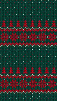 a red and green knitted pattern with snowflakes