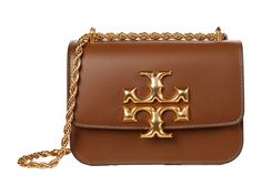 Tory Burch Eleanor Small Convertible Shoulder Bag - Handbags : Moose : Make brunch a stylish feast with your friends when you show up with the fancy smooth leather Tory Burch Eleanor Small Convertible Shoulder Bag featuring a chain shoulder bag. Flap with magnet closure and signature double T detail at front. Leather lining features an interior zip and slip pocket. Imported. Measurements: Bottom Width: 7 in Depth: 3 in Height: 5 in Strap Length: 44 in Strap Drop: 12 in Weight: 1 lb 6 oz Chic Brown Bags With Metal Logo, Elegant Shoulder Bag With Metal Logo For Travel, Formal Tan Shoulder Bag With Chain Strap, Tan Shoulder Bag With Gold-tone Hardware For Errands, Elegant Brown Shoulder Bag With Metal Logo, Luxury Brown Shoulder Bag With Metal Logo, Versatile Brown Shoulder Bag With Gold-tone Hardware, Brown Satchel Shoulder Bag With Gold-tone Hardware, Kate Spade Brown Shoulder Bag With Gold-tone Hardware