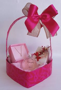 a pink gift basket filled with personal items