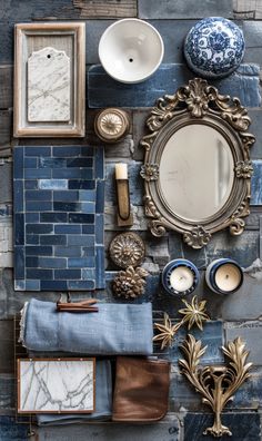 an assortment of blue and white items arranged on a wall