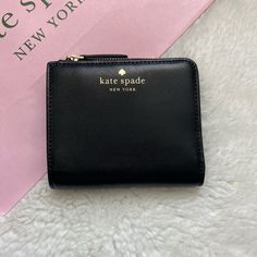 Brand New With Tag And Care Card Kate Spade Kali Wallet: - Card Pockets - Bill Pocket - Coin Compartment With Zip Closure - Clear View I.D Pocket - Kate Spade Logo Kate Spade Wallet With Interior Card Slots, Kate Spade Wallet With Interior Card Slots As Gift, Kate Spade Wallet With Interior Card Slots For Gift, Kate Spade Wallet Perfect For Gift, Classic Rectangular Kate Spade Wallet, Black Leather Kate Spade Wallets, Kate Spade Rectangular Wallet Perfect For Gift, Kate Spade Bifold Coin Purse, Kate Spade Rectangular Wallets Perfect For Gifts