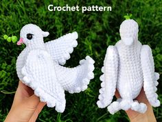 two crocheted white birds with pink beaks