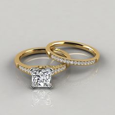 PRODUCT DETAILS
This Beautiful Moissanite Princess Cut Graduated Milgrain Bridal Set Rings is available in White, Yellow or Rose Solid Gold (14K or 18K) and also in Platinum.

The rings can be customized to your exact specifications to accommodate a center stone from 1.00 to 2.50 carats and it comes as pictured with an additional 24 round brilliant cut side stones, in total carat weight of 0.37 Ct.

Please select your choice of precious metal and ring size from the drop-down menus above.
EVERY M Luxury Bridal Set With Diamond Accents, Moissanite Diamond Ring With Diamond Accents For Marriage, Moissanite Ring With Diamond Accents For Marriage, Timeless Diamond Ring For Marriage, Elegant Yellow Gold Radiant-cut Ring With Single Cut Diamonds, Yellow Gold Radiant-cut Wedding Ring With Single Cut Diamonds, Timeless Diamond Marriage Rings, Elegant Princess Cut Diamond Bridal Sets, Luxury Vvs Clarity Diamond Ring For Marriage