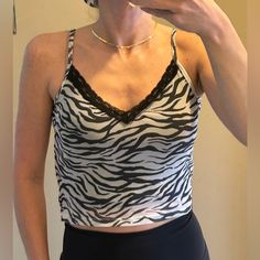 Brand New Condition Hollister Animal Print Lace Trim Mesh Cami, Size Medium. This Top Has A V-Neckline That Is Lace-Trimmed. It Is Mesh Zebra-Print Camisole That Is Fully Lined. The Straps Are Adjustable! Make Me An Offer Today! Spring Zebra Print V-neck Top, Casual Sleeveless Zebra Print Top, Zebra Print Summer Vacation Top, Summer Vacation Zebra Print Top, Zebra Print, Hollister, Lace Trim, Mesh, Animal Print