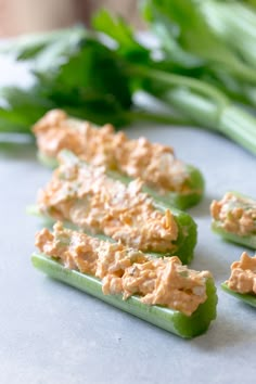 buffalo chicken celery sticks on a cutting board