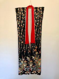 Vintage kimono hand-selected in Kyoto, Japan. Black sleeveless kimono with colorful and four season nature pattern - iris, Japanese maple, chrysanthemum, bamboo, plum flower, and bird.  The chirimen (woven silk crêpe) fabric adds a wrinkled texture. Please note that there is a small stain on the red collar (shown in the last photo). The vivid colors and auspicious patterns make it a great wall-hanging piece, too! ● 100% Silk ● Fair condition ● Lining ● Dry clean  Body width (side seam to side se Sleeveless Kimono, Nature Pattern, Kimono Vintage, Plum Flowers, Clean Body, Kyoto Japan, Vintage Kimono, Red Collar, Patterns In Nature