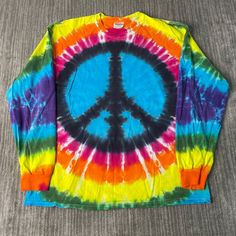 Vintage 2000s Peace Sign Tie Dye Pattern Basic Essential Streetwear Y2K Aesthetic Multi Color Long Sleeve Shirt Extra Large Mens Condition:  Fair Used Condition  = Has Holes Throughout The Shirt Due To Age And Wear  Measurements: Please see photos above for all measurements IF YOU BUY TWO OR MORE ITEMS USE THE CODE BUNDLE @ CHECK TO SAVE 20% WE SHIP WITHIN 24 HOURS AFTER PURCHASE! Please be aware that we do not offer free returns!! The Buyer is responsible for the cost of the return label. Follo Y2k Multicolor Tops For Streetwear, Tie-dye Long Sleeve Streetwear Tops, Tie Dye Long Sleeve Streetwear Top, 90s Style Long Sleeve T-shirt For Spring, 90s Long Sleeve T-shirt For Spring, 90s Style Long Sleeve Shirt For Streetwear, 90s Long Sleeve Shirt For Streetwear, Multicolor Long Sleeve Shirt For Streetwear, Long Sleeve Graphic Print Hippie Top