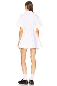 Self: 98% organic cotton, 2% elastane Contrast Fabric: 100% cotton Made in China Machine wash Unlined Split neckline with button closure Hidden side zip closure Side slip pockets Poplin fabric with cuffed sleeves White Shirt Dress, Poplin Fabric, Cuff Sleeves, Stretch Cotton, Side Zip, Split, Organic Cotton, Shirt Dress, China