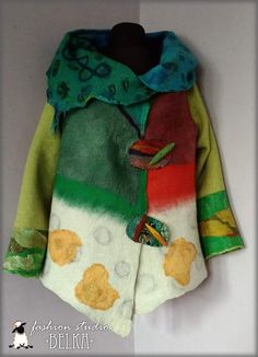 a colorful coat hanging on the wall