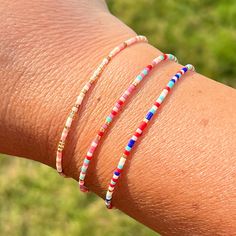 "Sweet delicate beaded bracelets are the perfect gift. (And yes, self-gifting is highly recommended!)  + styles shown in main image: (L to R) SUNRISE, SUNSET, and POP SEED BEAD STRING BRACELET  + glass and gold-plated tiny seed beads (about 1.6 millimeters each) + durable blush silk cord + adjustable from 5\" - 9\" + sliding bead makes for easy on/off design + finished with gold filled crimps that won't tarnish + all Libby & Smee beaded bracelets come packaged on a logo card in a clear resealing Beaded String Bracelets, Small Beaded Bracelet, Tiny Bead Bracelet, Sunrise Colors, Bracelets Tutorial, String Bracelets, Pale Peach, Seed Bead Bracelet, Silk Cord