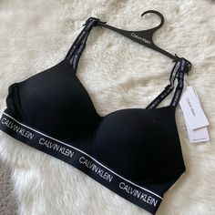 Calvin Klein Logo Tape Bra Medium Archive Logo Lightly Lined Wirefree Black Nwt New With A Tag Black Loungewear Bra, Kelvin Klein, Calvin Klein Fitted Underwire Bra, Sports Bra Calvin Klein, Calvin Klein Black Stretch Bra, Calvin Klein Bras, Calvin Klein Fitted Seamless Bra, Calvin Klein Bra Black, Tube Bra