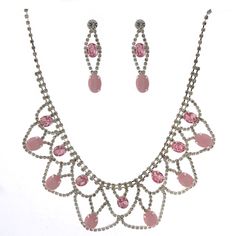 The necklace measures approximately 13" long with a 6" long extender Oval Crystal Jewelry With Rhinestones, Pink Teardrop Rhinestone Jewelry, Teardrop Pink Rhinestone Jewelry, Light Rose, Half Circle, Rose Lights, Necklace Earring Set, Necklace Earrings, Earrings Set