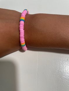 Homemade bracelet, and very stretchy! Can fit any wrist! Casual Stretch Bangle Bracelet For Friendship, Casual Friendship Bangle Stretch Bracelet, Multicolor Stretch Bracelets Casual Style, Casual Stretch Bangle Bracelet With Letter Beads, Trendy Stretch Multicolor Bracelets, Trendy Multicolor Stretch Bracelets, Flexible Casual Stretch Bracelet For Beach, Flexible Casual Beach Stretch Bracelet, Casual Beach Stretch Bracelet