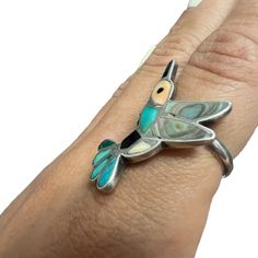 Vintage Zuni Sterling Silver And Inlaid Gemstones Hummingbird Ring By Howard Esalio. Size 6.25 Weight Is 5 Grams. Very Good Condition. Coral, Turquoise, Sterling Silver. 30126 M-A-Bs Native American Hummingbird, Hummingbird Ring, Unique Multi-stone Turquoise Ring In Sterling Silver, Southwestern Hallmarked Sterling Silver Jewelry, One-of-a-kind Silver Turquoise Ring In Sterling Silver, Unique Nickel-free Sterling Silver Turquoise Ring, Adjustable Southwestern Turquoise Ring Nickel-free, Coral Turquoise, Turquoise Sterling Silver