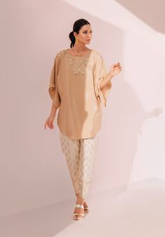 SKU: 3002 Price for Shirt & Trouser 2pc This stellar piece consist of soft creoe silk with delightful cutwork details. Paired with a embroidered pants with thread and sequins details- giving it a modernly grace. Silk Wedding Sets With Set-in Sleeves, Elegant Designer Pant Set With Chikankari Embroidery, Elegant Designer Chikankari Embroidery Pant Set, Elegant Chikankari Embroidered Pant Set, Elegant Sets With Set-in Sleeves And Straight Pants, Elegant Silk Blouse With Dabka Work, Elegant Silk Sets With Straight Pants, Festive Elegant Sets With Straight Pants, Elegant Silk Pant Set With Dabka Work