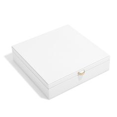 a white box with a gold ring on the lid and bottom is shown in front of a white background