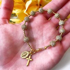 Bead: Gold Pave BeadsCharms: Mother Mary & CrossSize: CustomIf you have any other questions, please feel free to send me a message! Catholic Jewelry Bracelets, Catholic Bracelet, Custom Rosary, Bead Rosary, Pave Beads, Catholic Jewelry, Rosary Bracelet, Handmade Jewelry Tutorials, Catholic Gifts