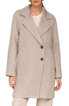 A blazer-inspired silhouette with notched lapels lends refinement to a longline coat cut with an off-center placket and lightly kissed with warm wool fibers. 35" length Asymmetric button closure Notched lapels Front welt pockets Lined 70% polyester, 30% wool Dry clean Imported Notch Lapel Wool Coat For Office In Spring, Spring Wool Coat For Business Casual With Notch Lapel, Spring Business Casual Wool Coat With Notch Lapel, Classic Notch Lapel Wool Coat For Spring, Classic Wool Coat With Notch Lapel For Spring, Modern Pea Coat With Hidden Button Closure For Fall, Modern Pea Coat With Hidden Buttons For Fall, Spring Wool Coat With Lapel Collar, Spring Business Casual Pea Coat With Notch Lapel