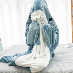 Dive into comfort with our Cozy Shark-Themed Sleeping Bag Pajamas and Shawl, perfect for both adults and children. Designed to keep you snug while unleashing your inner shark, this unique garment combines the playful charm of a cartoon shark with the practical warmth of high-quality pajamas. Whether you're lounging at home or using it as a comfortable travel companion, this versatile garment is suitable for year-round use. Key Features Realistic shark print design that wraps around your legs for Shark Sleeping Bag, Shark Onesie, Shark Blanket, Shark Pajamas, Shark Costumes, Cartoon Shark, Flannel Hoodie, Shark Lover, Comfy Blankets