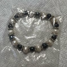 Nwt Beautiful Black And White Beaded Bracelet Black Beaded Pearl Bracelets, Adjustable Black And White Beaded Jewelry, Black Pearl Beaded Bracelets, Elegant White Bracelets With Black Beads, Elegant White Bracelet With Black Beads, Adjustable White And Black Beaded Bracelets, Adjustable Black Pearl Beaded Bracelets, Black Pearl Bracelets With Round Beads, Elegant White Stretch Bracelet With Black Beads