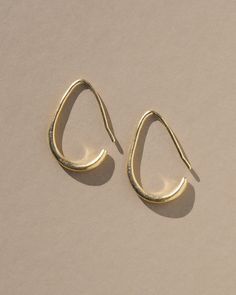 Sleek & stylish, these delicate open hoop earrings are based on a pair of hoop earrings from ancient Persia which are over 2,000 years old. They originate from Susa, one of the oldest cities in the world. Artifacts discovered at the site with the earrings include carved cylinder seals, jewelry, beads, clay balls an Beads Clay, Cylinder Seal, Ancient Persia, Open Hoop Earrings, Opal Earrings Stud, Opal Studs, Jewelry Beads, Recycled Metal, Stud Earrings Set