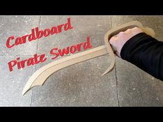 How to make a DIY Cardboard Pirate Sword - YouTube Pirate Swords Diy Cardboard, Cardboard Swords Diy, Pirate Swords Diy, Painted Sticks Diy, Aladdin Jr, Pirate Costume Accessories, Costume Accessories Diy, Diy Cans