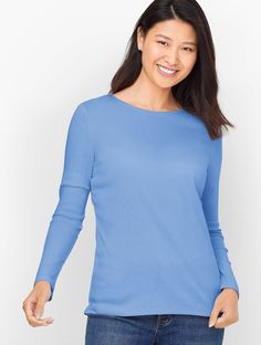 Our versatile, ready-for-anything crewneck t-shirt. Made from soft, breathable cotton with a hint of stretch. Features Tee Shirt Long Sleeve Hits At Hip Crew Neck Straight hem Imported Fit: Misses: 25"; Petite: 24"; Plus: 27" ;Plus Petite: 25 1/2" Material: 100% Pima Cotton Care: Machine Wash Cold; Only Non-Chlorine Bleach When Needed; Turn Garment Inside Out; Tumble Dry Low; Warm Iron, If Needed | Pima Crewneck T-Shirt - Solid Talbots Tee Shirt Long, Long Tee Shirts, Red Long Sleeve Tops, White Stripes Shirt, Henley Sweater, Striped Long Sleeve Tee, Classic Style Women, French Women, Comfortable Tops