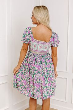 - Be first in line to add this beautiful fan fav to your wardrobe this season! - Unlined lightweight material with a white, blue, green, pink, and purple hued floral print - An elastic scoop cut neckline - Short puff sleeves with elastic shoulders and elastic cuffs - A smocked bodice - An elastic waistline - A flowy and flattering silhouette that ends in a straight mini dress length hemline Be First, Purple Hues, Pink And Purple, Floral Mini Dress, Puff Sleeves, White Blue, Smocking, Dress Length, Puff Sleeve