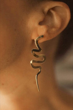 Make a statement in these swirling, snake-like earrings that drip from your ears like ribbons of cascading water. Lightweight but impactful, these modern Medusa earrings catch the light in the most elegant, seductive way. Modern Medusa, Medusa Earrings, Ribbon Earrings, Snake Jewelry, The Light, Favorite Jewelry, Fashion Jewelry, Ribbon, Water