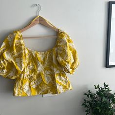 Nwt. Never Worn, Cute Yellow Tropical Cropped Top. Sleeves Can Be Worn Up On Shoulders Or Off The Shoulders. Perfect For A Warm Vacation. Trendy Yellow Beach Blouse, Yellow Summer Tops For Brunch, Yellow Lemon Print Vacation Top, Yellow Lemon Print Beach Top, Yellow Cotton Blouse For Day Out, Trendy Yellow Vacation Blouse, Yellow Summer Tops For Daytime, Trendy Yellow Blouse For Vacation, Yellow Summer Blouse For Day Out