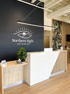 the front desk of an office with a sign that says northern sight optomery