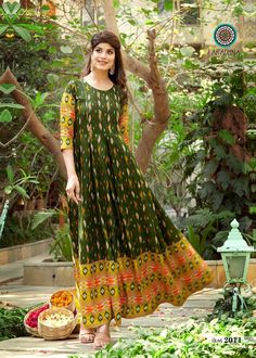 "Soft and comfort Trendy women floor touch gown with comfoet of rayon.  Sizes :- S-34, M-36, L-38, XL-40 and XXL-42 Length - 53\" Sleeve -3/4th sleeve" Traditional Long Festive Maxi Dress, Traditional Long Maxi Dress For Festive Occasion, Traditional Green Festive Maxi Dress, Traditional Green Maxi Dress For Festive Occasions, Festival Bandhani Print Maxi Salwar Kameez, Festival Bandhani Print Salwar Kameez In Maxi Length, Festival Bandhani Print Maxi Length Salwar Kameez, Ankle-length Kalamkari Print Kurta For Festivals, Festive Cotton Maxi Dress For Festivals