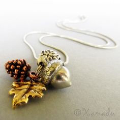 Autumn Harvest Fall Pendant Necklace - Gold Leaf, Copper Pine Cone, Silver Acorn #XanaduDesigns Artisan Jewelry Necklaces, Old Oak Tree, Charm Beads, Autumn Harvest, Handcrafted Artisan Jewelry, Silver Dangle Earrings, Sterling Silver Dangle Earrings, Fall Jewelry, Leaf Charms