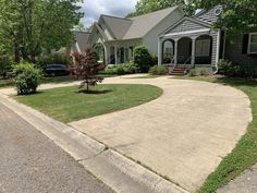 a house with a driveway in front of it