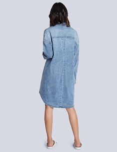 This utility shirtdress is cut from stretchy denim and meant to be worn whenever you're feeling extra-cute and carefree - AKA, everyday! Summer Denim Washed Shirt Dress, Relaxed Fit Chambray Denim Dress In Medium Wash, Relaxed Fit Denim Blue Chambray Dress, Relaxed Fit Chambray Denim Dress, Chambray Denim Dress With Relaxed Fit, Oversized Long Sleeve Denim Dress In Medium Wash, Trendy Collared Denim Dress In Relaxed Fit, Oversized Long Sleeve Medium Wash Denim Dress, Trendy Relaxed Fit Collared Denim Dress