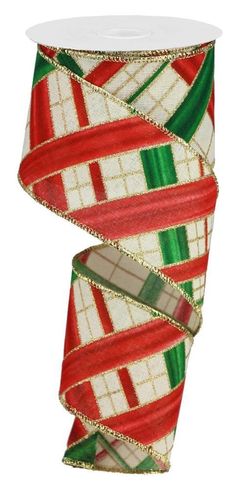 a roll of christmas ribbon with red, green and white ribbons on it's side