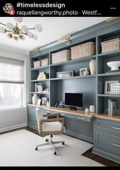 a home office with blue bookcases and white carpet