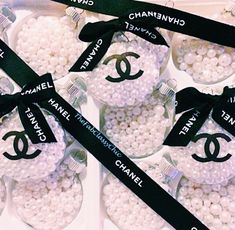 chanel ornament ornaments with black ribbon and white pearls in a gift box