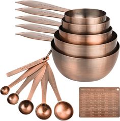 a set of measuring spoons and measuring cups