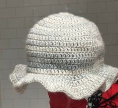 a crocheted hat is shown on top of a mannequin's head