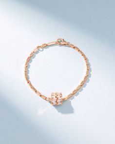 Crafted in 18-karat gold, this bracelet features a double row rondelle charm set with white diamond baguettes all the way around. By infusing our Block-Chain design, this bracelet combines simplicity with beautiful bold styling. Details 18k yellow gold, rose gold or white gold 1.55 carats of white diamond baguettes Measures 7" inches in length, adjustable to 6.5" inches Lobster clasp fastening 12mm diameter 10mm width 2.2mm link thickness Ref: AKB615D Block Chain, Rainbow Sapphires, Suzanne Kalan, Handmade Fine Jewelry, Chain Design, Charm Set, Baguette Diamond, Diamond Wedding Bands, Gold Rose