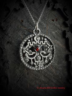 This Seal of Belial necklace is an handmade pewter sculpture with a gem of your choice (my favorite is the red abalone) This seal of Belial is one of the 72 Sigils of Goetia This Sigil of Goetia pendant is sold with a free 18'' stainless steel chain, if you would like to have a different length for the chain, you can write the desired length in the private note section when ordering :) This Seal of Belial is a pendant of 3cm diameter This Sigil of Belial is a pewter sculpture of my own creation, Round Pewter Jewelry As Gift, Bohemian Pewter Jewelry For Gifts, Round Pewter Jewelry Gift, Symbolic Jewelry With Oxidized Finish For Festivals, Antique Silver Sterling Silver Jewelry, Antique Silver Sterling Silver Jewelry With Antique Finish, Antique Silver Metal Necklaces For Ceremonial Occasions, Ornate Festival Jewelry With Antique Finish, Antique Finish Sterling Silver Jewelry In Antique Silver