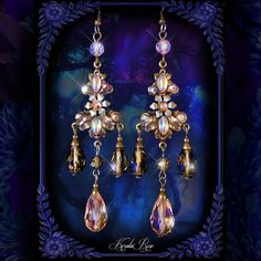 This pair of Handmade Chandelier Earrings is made with bronze Victorian replica stampings decorated with Swarovski rhinestones, Czech glass and brass floral embellishments.  Black Diamond and Blush Pink crystal beads dangle from the design.  Pierced with french wires (as shown), clip-ons, leverbacks or posts, just select from the pull-down menu.   -4" Long x 1 " Wide -0.2 oz. ea. *Comes Ready To Gift in Decorative Packaging *Each Pair is Made Just for You!  Kerala Rose Pinterest page: https://ww Victorian Chandelier Dangle Earrings For Party, Victorian Dangle Chandelier Earrings For Parties, Victorian Style Party Chandelier Earrings, Ornate Handmade Chandelier Earrings For Party, Handmade Ornate Chandelier Earrings For Parties, Gold Gothic Earrings For Parties, Pink Jeweled Dangle Chandelier Earrings, Elegant Pink Chandelier Earrings, Pink Bohemian Chandelier Earrings