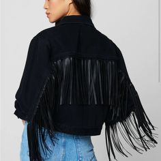 Black Denim Cropped Faux Suede Fringe Jacket [Body: 82% Cotton, 18% Polyester; Trim: 55% Cotton, 45% Polyurethane] [Machine Wash Cold With Like Colors, Use Gentle Cycle, Do Not Bleach, Hang To Dry, Iron Low On Reverse Side, Do Not Iron On Trim] Black Fringe Outerwear, Black Fringe Long Sleeve Outerwear, Black Fringe Outerwear For Fall, Chic Black Outerwear With Fringe, Black Fringe Outerwear For Winter, Edgy Long Sleeve Denim Jacket For Fall, Black Fringed Outerwear For Winter, Chic Fringed Outerwear For Night Out, Long Sleeve Biker Jacket With Fringe For Spring