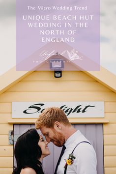 a man and woman standing in front of a yellow building with the words, unique beach hut wedding in the north of england