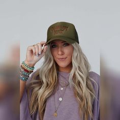 Introducing our Not Your Cowboy Trucker Hat; it's a statement, a reflection of your laid - back attitude and a perfect addition to your boho ensemble! You're going to love this hat because it features: Classic foam trucker hat style Adjustable back closure for the best fit So cute "Cowboy Hat" embroidery detail along the front *Due to lighting and differences in monitors, actual colors may vary slightly from what appears online. Model is 5'8" and wearing a size One Size. Approximate measurements are as follows: ONE SIZE: Circumference: 20", Brim: 3" 100% Polyester Hand wash cold, Lay flat to dry Import Country Style Adjustable Trucker Hat For Spring, Trendy Adjustable Trucker Hat For Travel, Trendy Travel Hat One Size Fits Most, Trendy Trucker Hat With Short Brim For Festivals, Trendy Snapback Hat For Travel, Adjustable Fall Trucker Hat With Curved Brim, Adjustable Curved Brim Trucker Hat For Fall, Adjustable Trucker Hat With Curved Brim For Fall, Trendy Short Brim Trucker Hat For Festivals