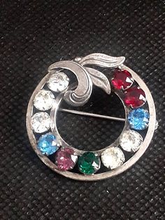 Signed Van Dell Sterling Vintage Gemstone Round Brooches, Silver Round Brooch With 17 Jewels, Multicolor Round Brooch Jewelry, Vintage Multicolor Round Brooches, Round Multi-stone Brooch As Gift, Articulated Fish, Fish Pendant Necklace, Flagstaff Az, Horn Necklace