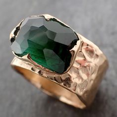 I created this setting in wax then cast it in recycled solid 18k yellow gold at my home studio. My husband partially faceted the gemstone. This ring is a size 7 it can be sized. The stone is a Green tourmaline. it measures about 9.5mm X 14mm I created a rustic texture in the gold. The hand textured wide band is around 11.5 mm. Throughout all time and history, in every tribe and culture all around the world crystals, minerals and gemstones have used for healing, luck, divination, adornment vibrat Minimal Jewellery, Rustic Texture, Minimal Jewelry, Minerals And Gemstones, Jewelry Lookbook, Statement Bracelet, Green Tourmaline, Wide Bands, Crystals Minerals