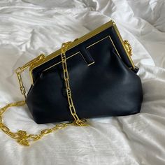 Versatile Clutch/ Shoulder Bag. Brand New. ** Gold Chain Not Included. The Black Strap Is Included ** Formal Tan Shoulder Bag With Chain Strap, Luxury Black Shoulder Bag With Gold Chain, Tan Rectangular Clutch For Evening, Chic Black Clutch For Travel, Classic Black Bag With Gold Chain, Chic Tan Shoulder Bag With Chain Strap, Tan Clutch Bag For Evening, Elegant Shoulder Bag With Gold Chain For Travel, Chic Evening Shoulder Bag With Gold Chain